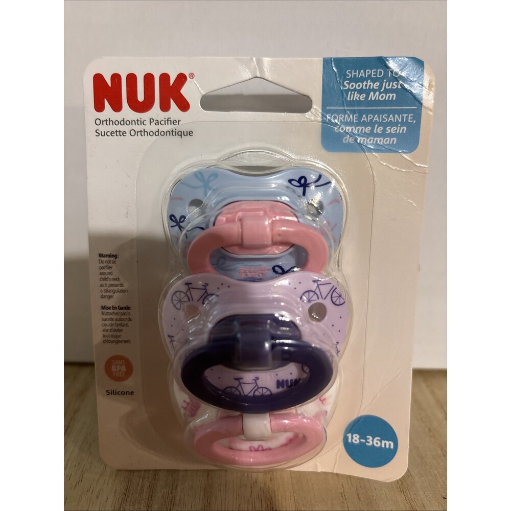 NWT NUK 3 Pack Orthodontic Pacifier- Girl Pink Purple Crowns And Bows 18-36M